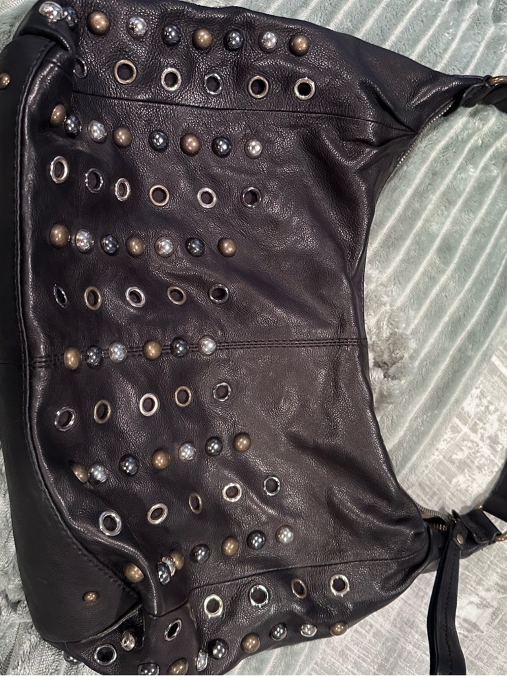 Studded Black Leather Shoulder Bag with Metallic Accents